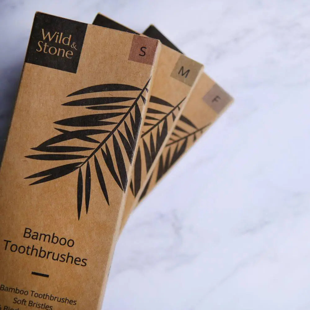 Craft toothbrush packaging on white marbled surface