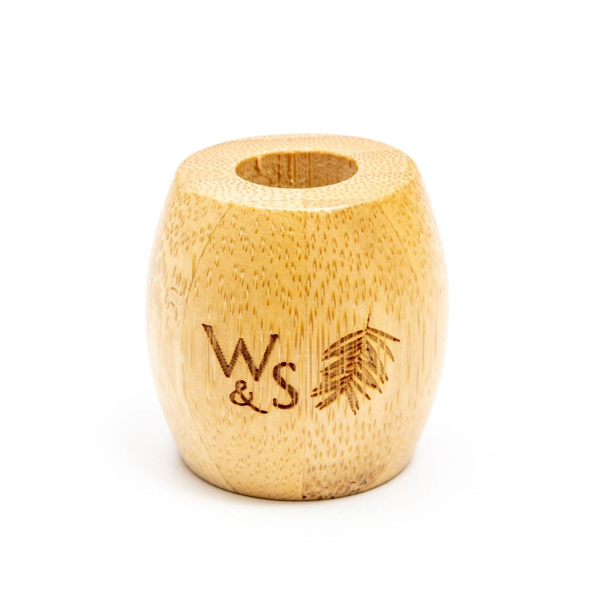 Close up of Bamboo Toothbrush Stand with W&S logo.
