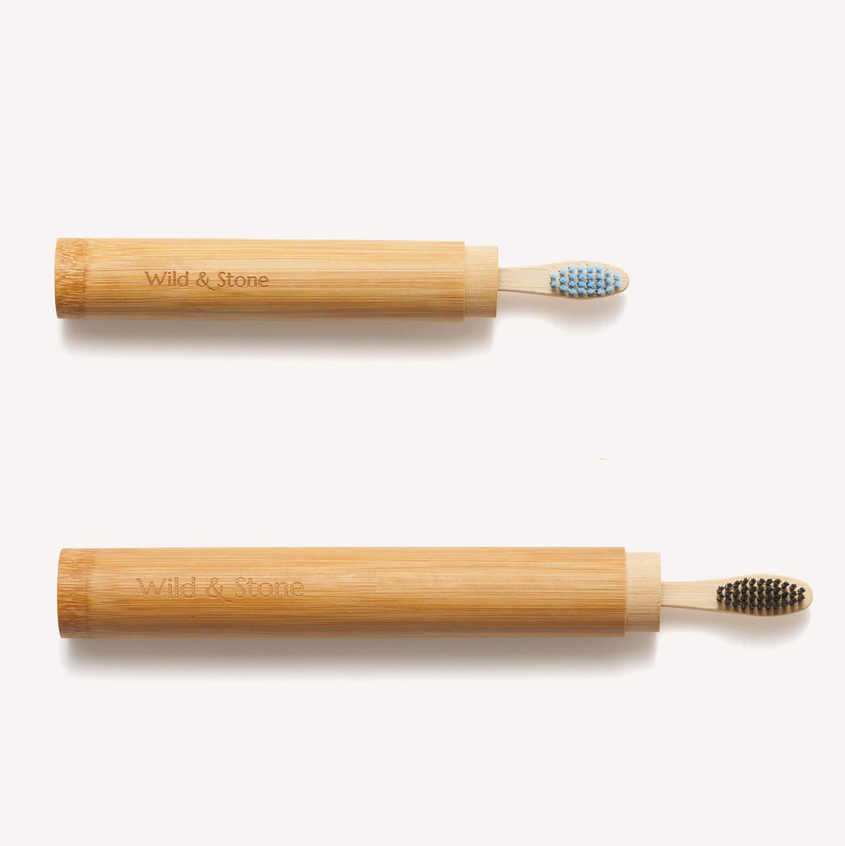 2 Bamboo Toothbrush Travel Holders and toothbrushes.